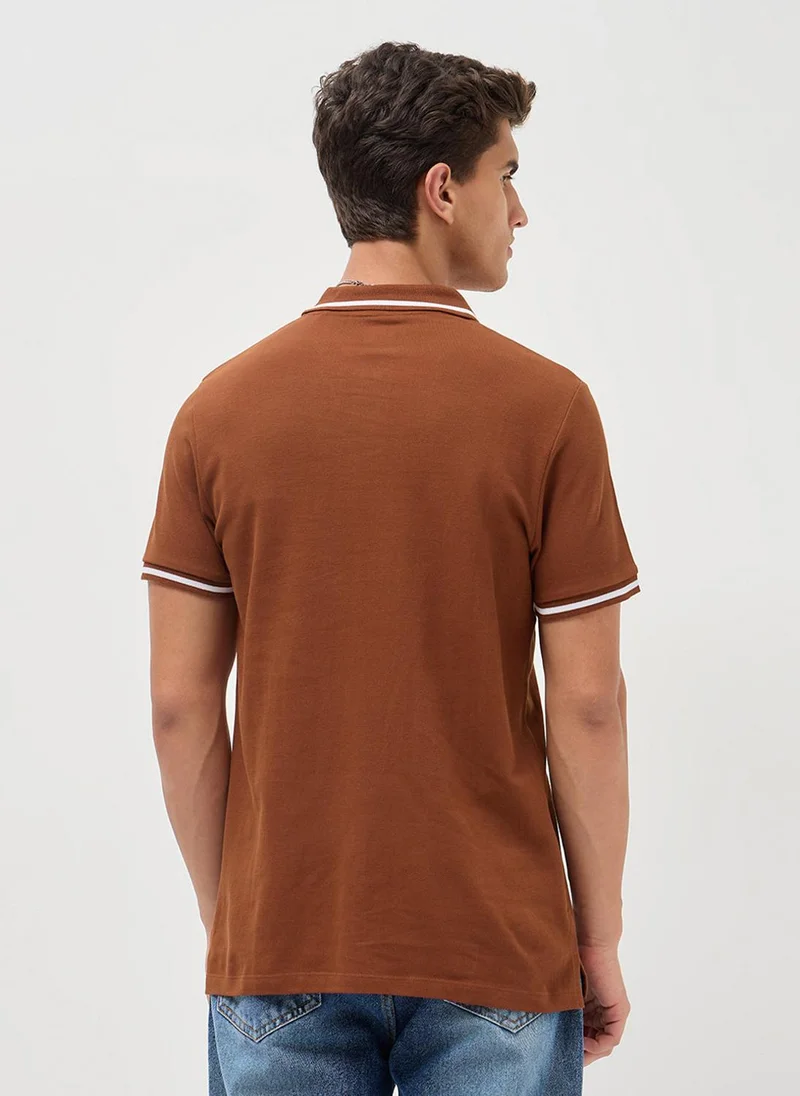 Urbano Fashion  Urbano Fashion Men's Chocolare Brown Solid Regular Fit Half Sleeve Cotton Polo T-Shirt for Men | Best Price UAE